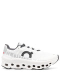 On Running tenis Cloudmonster blanco negro